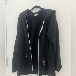 Eggie by Jenn Im black sweatshirt